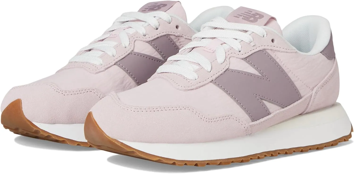 New Balance Women's 237 V1 Sneaker, Pink, 12